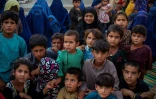Des familles de déplacés afghans à leur arrivée à Kaboul le 26 juin 2021