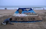 Une sculpture sur sable représente le pilote indien Smit Machchhar sur une plage de la ville de Puri, dans l’État d’Odisha, en Inde, le 1er octobre 2026