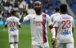 La joie de l'attaquant lyonnais Moussa Dembélé après avoir ouvert le score face à Montpellier, lors de la 34e journée de Ligue 1, le 23 avril 2022 au Groupama Stadium à Décines-Charpieu