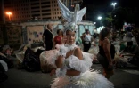 Des membres de l'école de samba Imperatriz Leopoldinense lors de la première nuit des défilés du carnaval au Sambadrome Marques de Sapucai à Rio de Janeiro, Brésil, le 22 avril 2022