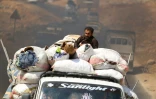 Des familles syriennes, fuiyant les combats à Idleb, arrivent dans un camp près de la frontière avec la Turquie, le 9 septembre 2018