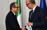Le ministre italien de l'Economie et des Finances Giovanni Tria (g) et le commissaire aux Affaires européennes, Pierre Moscovici, le 18 octobre 2018 à Rome