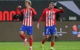 La joie d'Antoine Griezmann (g) auteur de son 174e but sous le maillot de l'Atlético Madrid, contre le Real Madrid, le 10 janvier 2024 à Ryad
