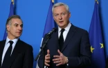 Le ministre de l'Economie Bruno Le Maire (d) et le président de la Fédération bancaire française (FBF) Nicolas Namias (g), lors de l'annonce de mesures de soutien au secteur agricole, le 27 février 2024 à Paris
