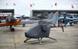 Des drones turcs sont exposés au salon international aéronautique et de l'espace à l'aéroport de Paris-Le Bourget, le 18 juin 2023