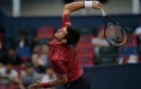 Novak Djokovic contre l'Américain John Isner au 3e tour du tournoi de Shanghai, le 10 octobre 2019