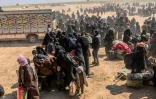 Femmes et enfants évacués de la dernière poche du groupe jihadiste Etat islamique à Baghouz en Syrie, arrivent dans un secteur sous contrôle des forces soutenues par la coalition internationale, le 6 mars 2019