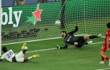 L'attaquant brésilien du Real Madrid Vinicius Junior ouvre le score contre Liverpool, lors de la finale de la Coupe d'Europe, le 28 mai 2022 au Stade de France à Saint-Denis
