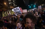 Des manifestants   défilent le 22 septembre 2016 dans la ville américaine de Charlotte pour protester contre la mort de Keith Lamont tué deux jours plus tôt par la police
