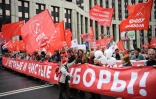 Des militants du Parti communiste russe défilent à Moscou le 17 août 2019 contre l'exclusion de dizaines de candidats aux élections locales de septembre.