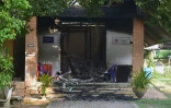 Un bâtiment endommagé après une série d'attaques incendiaires dans la province méridionale thaïlandaise de Narathiwat, le 23 août 2026
