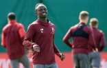 Sadio Mané, photographié à l'entraînement le 6 mai 2019 à Liverpool, sera privé de ses coéquipiers habituels d'attaque chez les Reds Mohamed Salah et Roberto Firmino