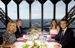 Les couples Macron et Trump lors d'un dîner sur la tout Eiffel à Paris, le 13 juillet 2017