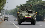 Un véhicule blindé patrouille à Cali, Colombie, le 6 août 2026 à la veille de l'investiture du président Abelardo de la Espriella