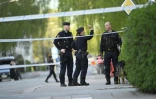 Cordon policier après une fusillade dans le centre d'Uppsala, en Suède, le 29 avril 2025