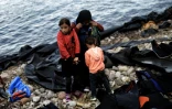 Des migrants arrivés sur l'île de Lesbos le 7 octobre 2015 après avoir traversés la mer Egée venant de Turquie