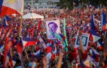 Des supporters de Ferdinand Marco Jr lors d'un dernier meeting de campagne, à Paranaque City, dans la banlieue de Manille, le 7 mai 2022 