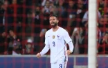 La joie de l'attaquant Olivier Giroud, après avoir marqué le 2e but pour la France face à l'Afrique du sud, lors de leur match amical, le 29 mars 2022 au Stade Pierre-Mauroy à Villeneuve-d'Ascq