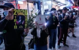 Des milliers de manifestants pro-démocratie ont formé le 31 décembre 2019 de longues chaînes humaines pour attendre le passage à 2020