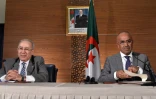 Le Premier ministre Noureddine Bedoui (d) et  son vice-Premier ministre Ramtane Lamamra, lors d'une conférence de presse le 14 mars 2019 à Alger
