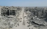 Des Palestiniens reviennent dans la ville de Gaza après le début du cessez-le-feu, le 11 octobre 2025