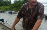 Mike Magee va secourir avec son bateau des amis menacés par Harvey, près de Hamshire, au Texas, le 28 août 2017