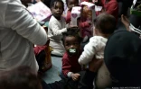 Photo fournie par les ONGs Medecins Sans Frontières (MSF) et SOS Mediterranée le 15 juin 2018 montrant des migrants à bord de l'Aquarius en route vers le port de Valence, en Espagne