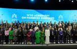 Photo de famille des participants à la réunion ministérielle de l'OMC, le 26 février 2024 à Abou Dhabi