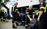 Des pompiers français arrivent à Farila, en Suède, pour aider les autorités locales à combattre des incendies de forêt le 24 juillet 2018