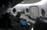 Ripley, le mannequin installé par SpaceX dans sa capsule Crew Dragon, peu avant le décollage le 2 mars 2019 depuis le Centre spatial Kennedy en Floride