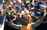 Rafael Nadal exulte après sa victoire sur l'Australien James Duckworth pour son entrée à l'Open d'Australie à Melbourne, le 14 janvier 2019