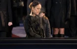 Céline Dion devant le cercueil de son mari et  René Angélil lors de ses obsèques le 22 janvier 2016 à la basilique de Montréal