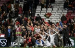 La joie des Serbes, vainqueurs du Portugal, 2-1, et qualifiés pour la Coupe du monde 2022 au Qatar, le 14 novembre 2021 à Lisbonne