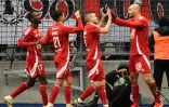 L'attaquant de Brest, Ludovic Ajorque (droite), félicité par ses coéquipiers après son but sur la pelouse du Havre, lors de la 19e journée de L1, le 26 janvier 2025