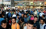 Des migrants arrivant de Hongrie à la gare de Munich le 31 août 2015