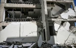 Un bâtiment universitaire détruit dans le puissant séisme qui a secoué l'île indonésienne de Florès, dans l'est de l'archipel, le 16 août 2026 à Ruteng, dans la province de Nusa Tenggara Est