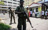 Les forces de sécurité sri-lankaises montent la garde devant l'hôpital national à Colombo, le 24 avril 2019