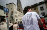 Un manifestant proteste contre le Forum économique mondial (WEF) à Davos, en Suisse, le 22 mai 2022