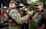 Des motards russes pro-Poutine du club "Loups de la nuit" rassemblés à Moscou pour le départ d'un rallye "patriotique" qui doit passer par l'Est de l'Ukraine et s'achever en Allemagne, le 29 avril 2023