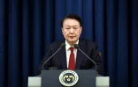 Photo publiée par la présidence sud-coréenne montrant le président déchu Yoon Suk Yeol, le 3 décembre 2024 à Séoul, lors de son discours de proclamation de la loi martiale
