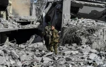 Des combattants des Forces démocratiques syriennes (FDS) soutenues par Washington sur la ligne de front ouest des combats contre les jihadistes du groupe Etat islamique (EI) à Raqa, le 8 octobre 2017