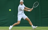 Le Français Hugo Grenier contre le Chilien Christian Garin au 2e tour de Wimbledon, le 30 juin 2022 à Londres