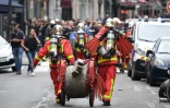 Les pompiers en alerte à proximité de la rue des Petites écuries à Paris, le 12 juin 2018