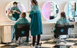 Des employées d'un salon de coiffure de Bruay-la-Buissière (Pas-de-Calais) se préparent le 8 mai 2020 en vue de la réouverture du salon après la fin du confinement