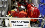 Des casques de pompiers, endommagés par les incendies de forêt de l'été, en attente de réparation dans l'atelier de logistique et de maintenance du SDIS 33 à Bordeaux, le 16 septembre 2026 en Gironde