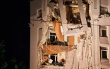 Un immeuble résidentiel en partie détruit par une frappe russe, le 28 juillet 2023 à Dnipro, en Ukraine