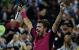 Le Suisse Stan Wawrinka exulte après sa victoire face au Britannique Daniel Evans au 3e tour de l'US Open, le 3 septembre 2016 à New York
