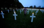 Les tombes de 3.500 soldats américains illuminées à Romagne-sous-Montfaucon (Meuse), le 11 novembre 2017 
3500 of the 14,246 graves at the necropolis were illuminated with candles.