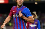 La joie du défenseur de Barcelone Sergi Roberto, après avoir marqué le 4e but face à la Real Sociedad, lors de leur match de Liga, le 15 août 2021 au Camp Nou