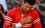 Le Serbe Novak Djokovic ému après sa victoire en finale de Roland-Garros contre le Grec Stefanos Tsitsipas, le 13 juin 2021
